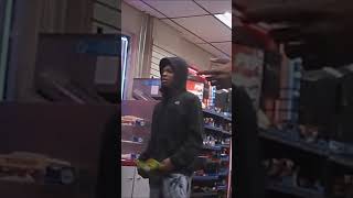 GUY STEALING CANDY AT DETROIT GAS STATION