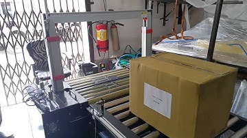VIDEO OF ONLINE TAPPING & STRAPPING MACHINE