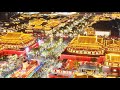 Foreign tourists experience chinas nightlife culture in xians datang everbright city block