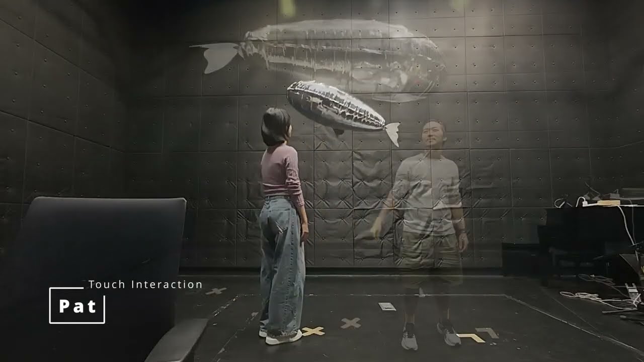 Cuddle-Fish: Exploring a Soft Floating Robot with Flapping Wings for Physical Interactions