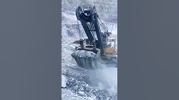 Bucket loading of open pit coal ore- Good tools and machinery make work easy