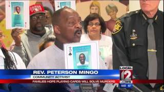 Families hope playing cards will solve murders