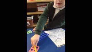 Reception using numicon to solve number bonds to 10
