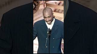 Tupac in a suit