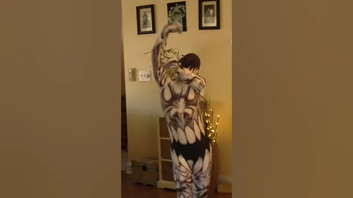 Boy in morphsuit dancing gangham  style