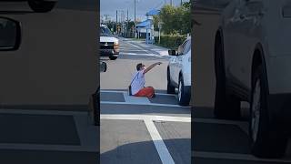Crazy Florida lady sits on crosswalk