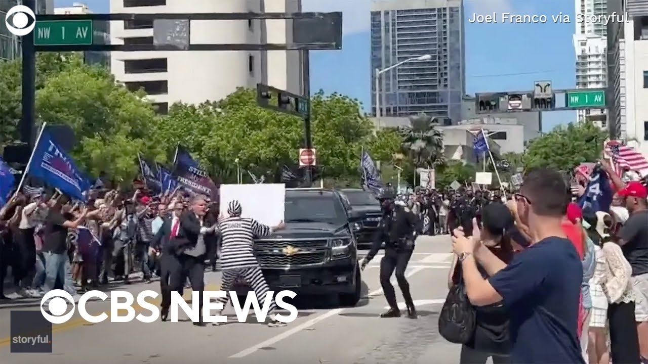 Protester detained after rushing Trump's motorcade outside Miami courthouse