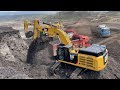 Two Cat 352F Excavators Loading Coal On Trucks