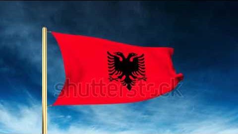 Albania flag slider style. Waving in the win with cloud background animation Stock video by