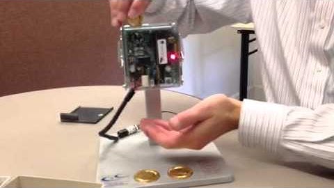 Setting up a coin acceptor that takes quarters, dollars, quarter tokens and dollar tokens