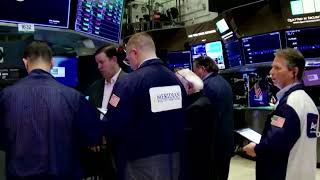 Wall St. ends higher as investors digest economic data