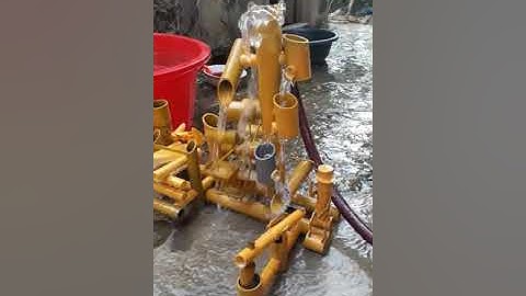 Bộ guồng nước có nhạc và giã gạo