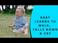 Silly baby learns to walk falls down and cry super cute