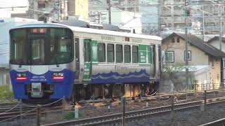 廃車置場からの車両に見送られ、車輪研削作業が終り、所属先へ戻って行った、えちごトキめき鉄道ET122形K2編成回送列車。