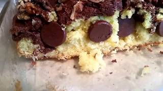 Yellow cake with chocolate frosting and chips walnuts