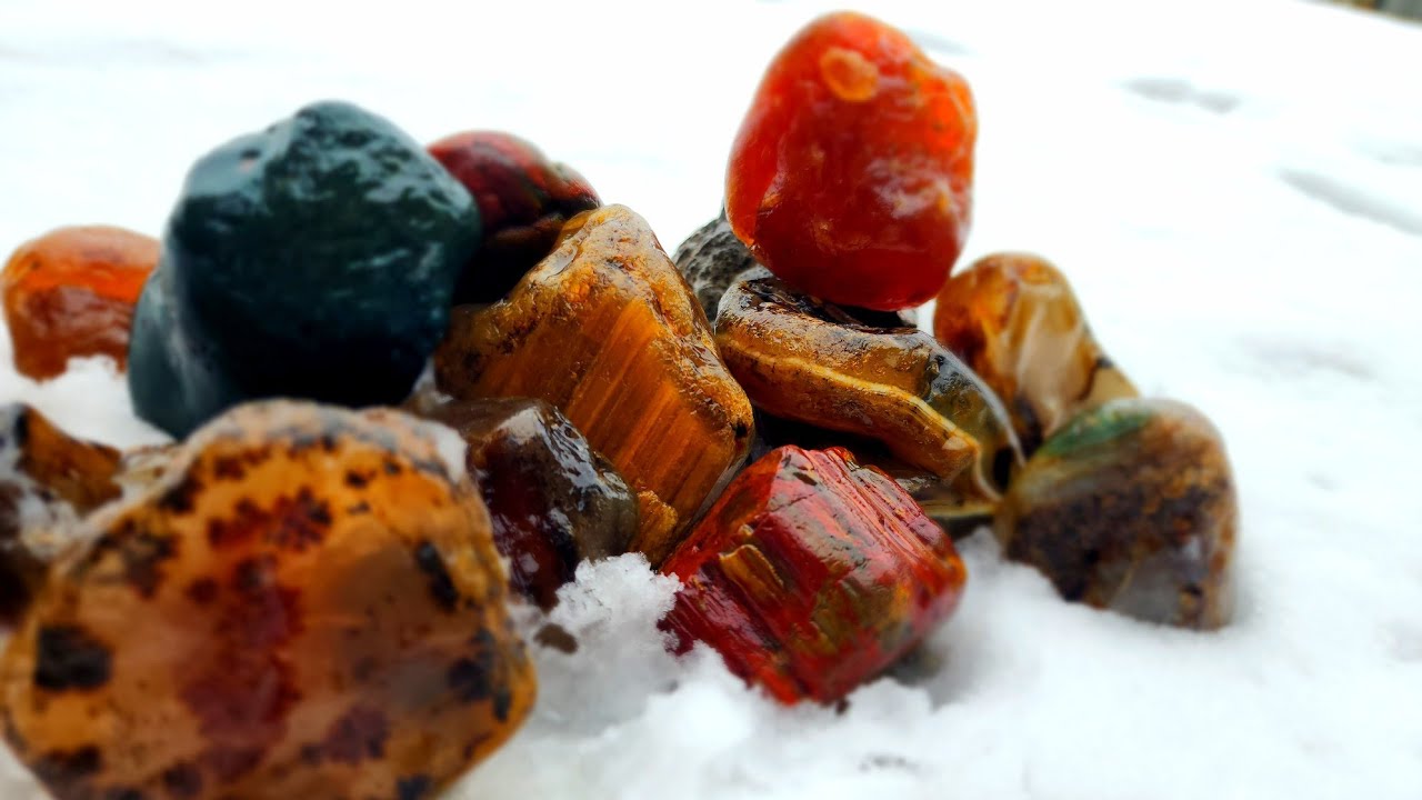 Discovering Hidden Gems In A Frozen Winter Creek 