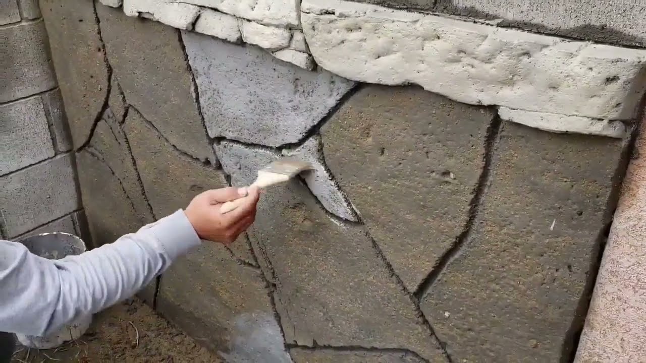 Flat stone on wall ,with just cement and sand 