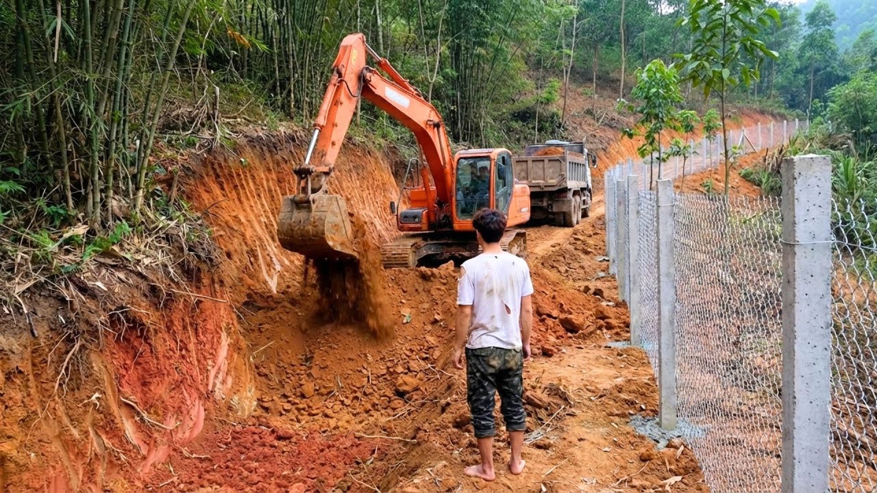 Building a Road to the Farm Using an Excavator and Trucks in a Remote Mountainous Area