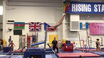 Double front dismount on competition landing (bars)