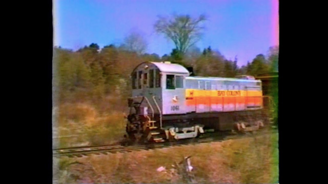 Bay Colony Railroad - Millis Line - 1061 Alco S4 Revenue Freight To Medfield, MA Junction 5/8/85