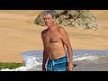 A shirtless Pierce Brosnan goes snorkeling while in Hawaii.