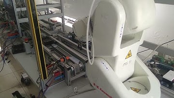 Interfaced Kawasaki Industrial Robot (RS003NA) with Siemens PLC for Material