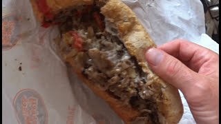 Eating A Gloppy Cheese Steak Sandwich From Jersey Mike's