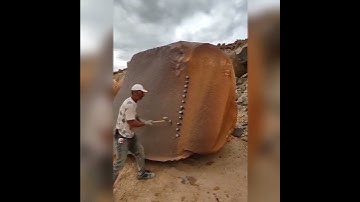 Man breaking a massive rock with nails #amazing #work