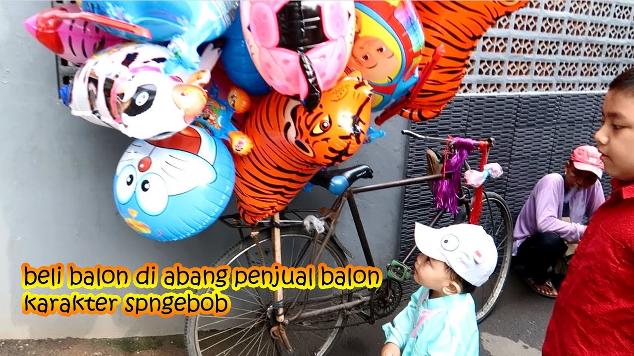 street toy Athar beli balon  karakter  spongebob di  abang 