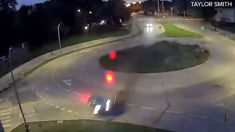 Surveillance footage shows car fly over Dallas traffic circle in crash