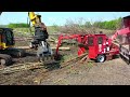 Komatsu Excavator helping out the Morbark Chipper