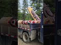 loading up carvings on crane truck