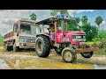 lorry heavy loaded stuck in heavy mud rescue by mahindra 555 tractor