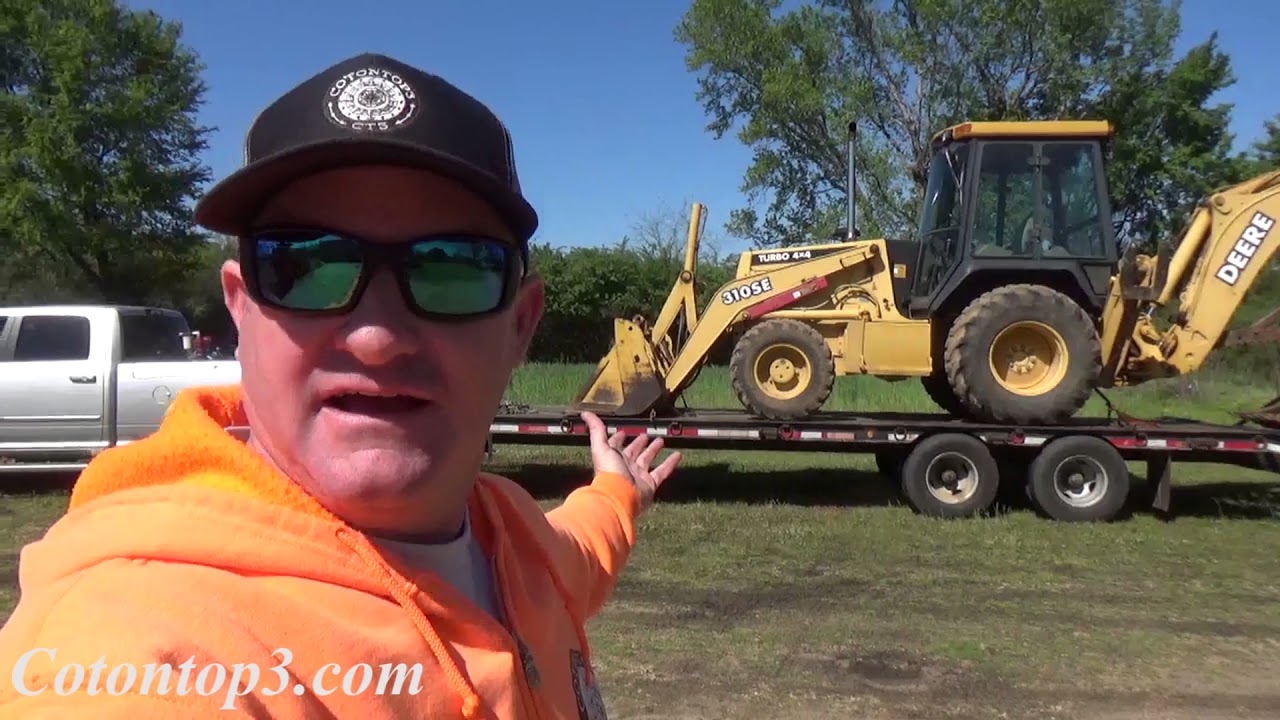 Dodge Ram 3500 Cummins diesel pulling a John Deere backhoe - YouTube