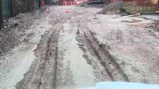 Mud crossing on Kenworth.   Flatbeds
