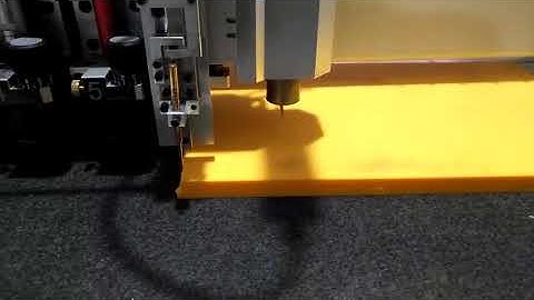 Dyhua pertinax machine with cutting rubber function.