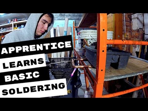 plumbing-apprentice-learns-basics-of-soldering-copper-pipe