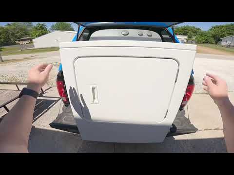 How to unload a washer and dryer by yourself from a truck