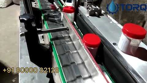 Urine containers capping and labeling machine