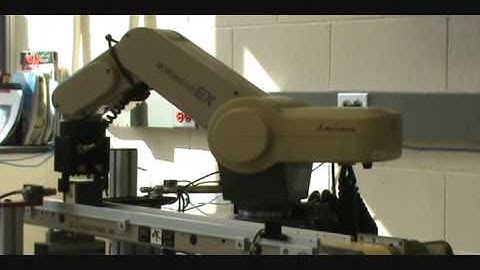 Automation of the conveyor by FX3G Mitsubishi PLC, Robotic Arm, HMI and  Cognex Camera