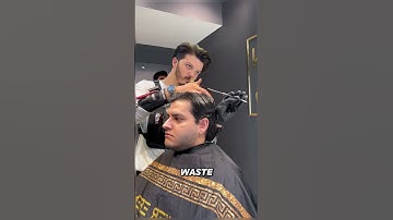 Theatrical Barber: Is This Scissor Twirling Too Much for a Haircut? 🤨