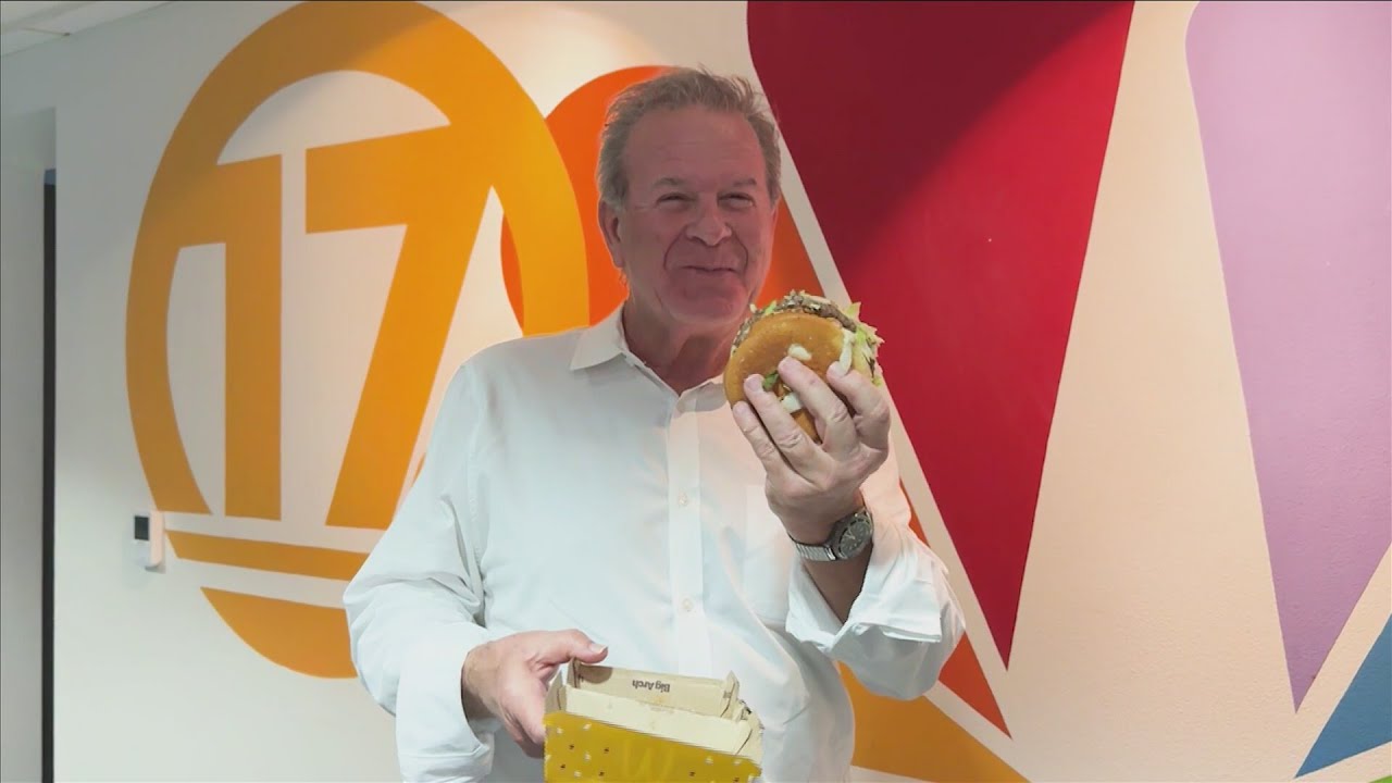 Big Arch, big bite: Robert Price tries McDonald's latest menu item