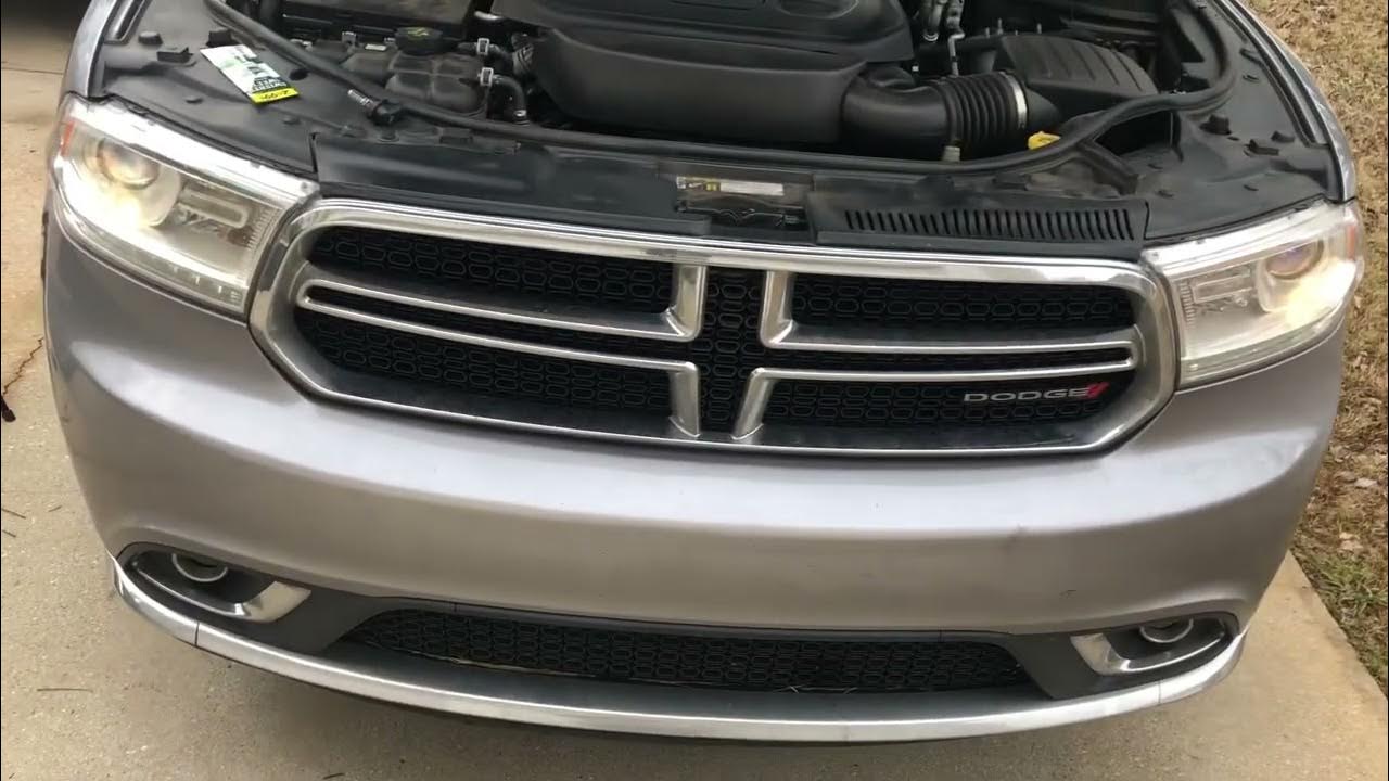 How to replace 2014-2018 Dodge Durango head lights. No tools needed