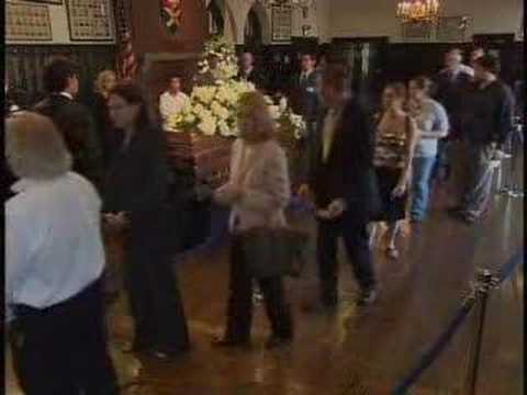 This is a video record of Tim Russert's wake, with background music added. The service was held at St. Albans School in Washington DC on June 17, 2008. The music is Bruce Springsteen, Tim's favorite, and the selection is Jungleland from the Born To Run album. This footage is towards the end of the wake with the last of the thousands of friends that attended, paying their respects. The footage concludes with Luke Russert, Tim's son, greeting friends next to his father's casket, and then a few classic photos of Tim, those he most loved, and those he was most loved by.