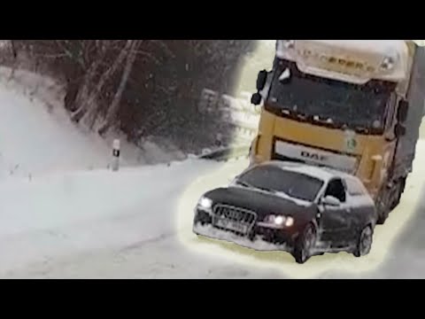 Audi Estate Hauls Truck Up A Snowy Hill