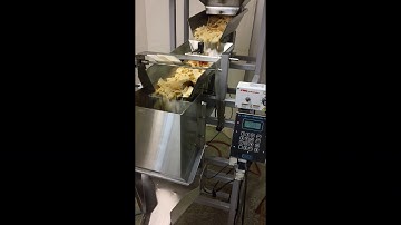The Logical Machines Model S-6 Cascading Scale System filling Tortilla Chips.