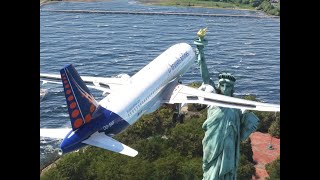 The Airbus A320 passes right over the Statue of Liberty