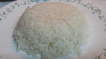 How do you keep rice from sticking to a stainless steel pan?