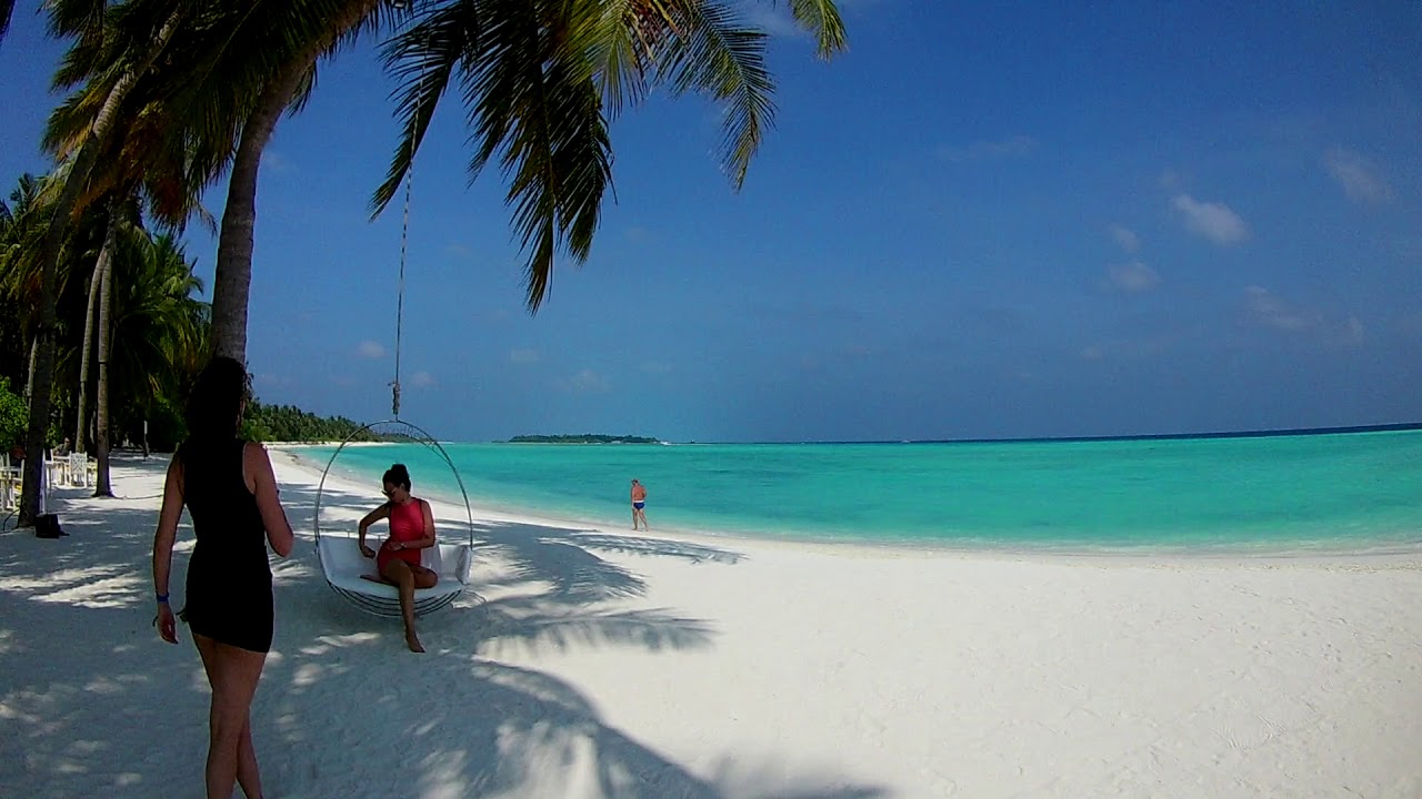 Beautiful girls photo shoot in Sun island Maldives beach