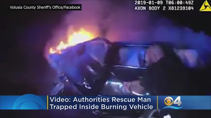 Dramatic Video Shows Florida Officers Rescue Man From Burning Car
